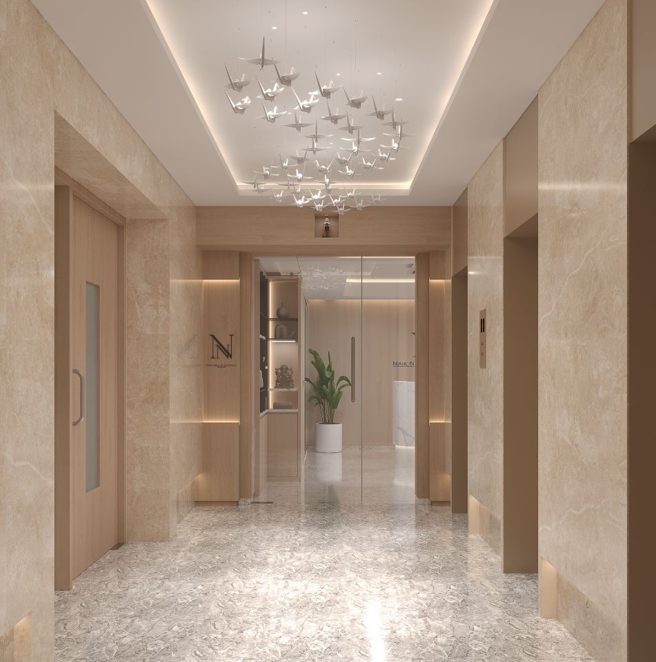 Elegant hotel lobby with a paper crane chandelier designed by JTCPL Designs